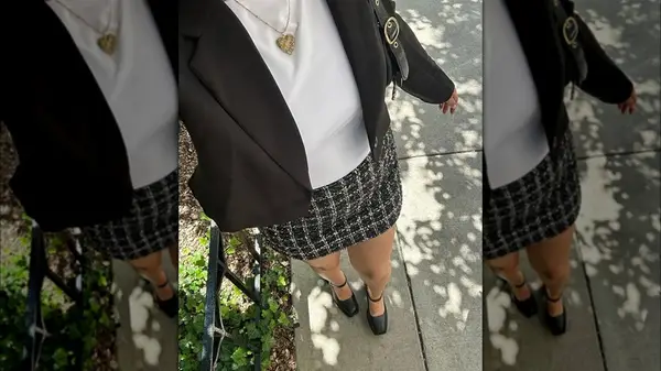 Woman wearing a skirt and Mary Janes