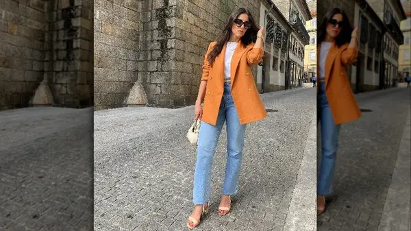 Woman wearing jeans and blazer