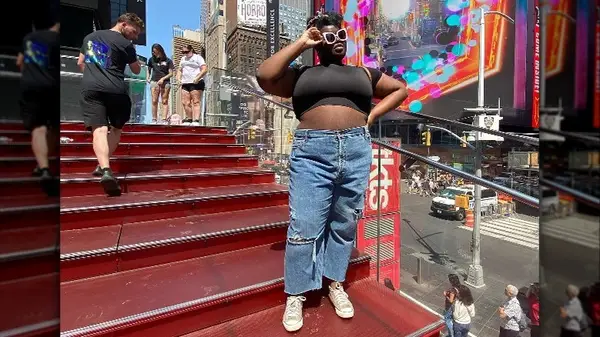 Person posing in jeans 