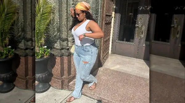 Woman in distressed jeans