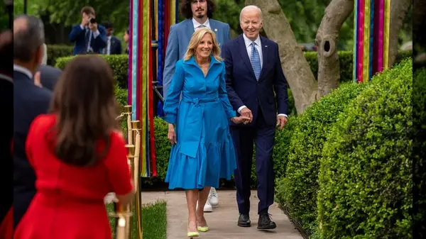 Jill Biden in a blue dress with Joe Biden
