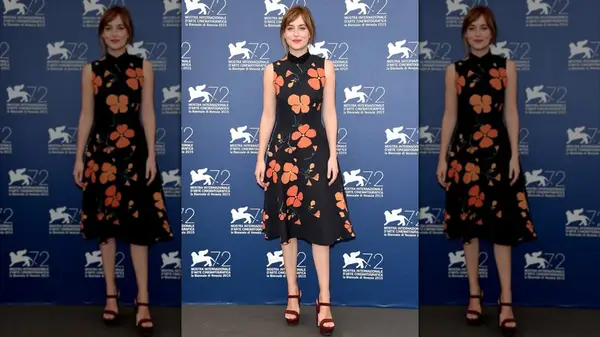 Dakota Johnson in a black dress in Venice in 2015