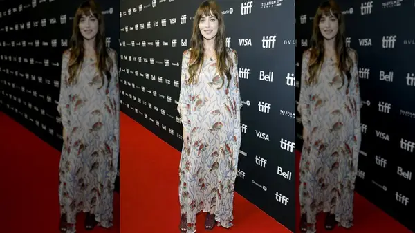 Dakota Johnson in a fish dress at an event