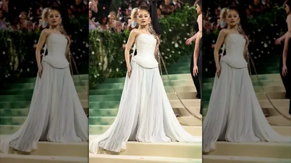 Ariana Grande posing in mother-of-pearl gown at the 2024 Met Gala