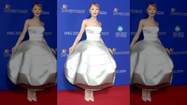 ariana grande posing in a silver bubble dress at the 36th Annual Palm Springs International Film in january 2025