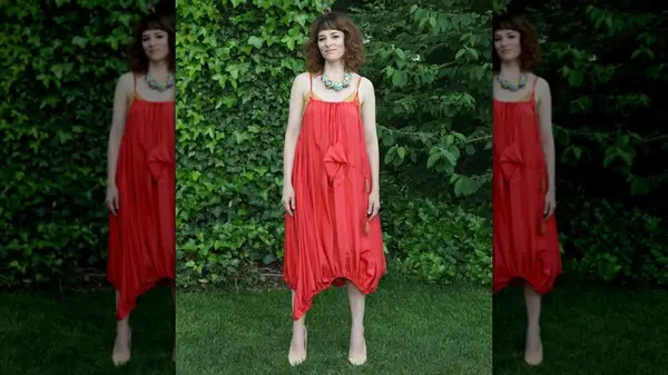 Parker Posey in a harem-style dress