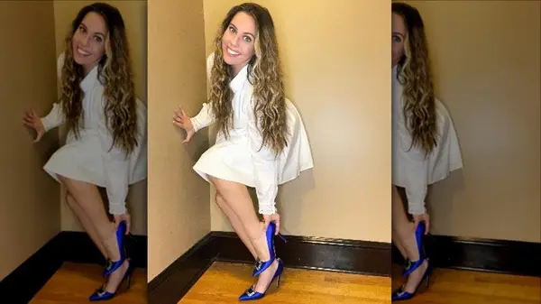 Woman putting on blue shoes