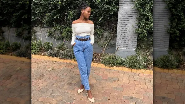 Woman wearing jeans and sweater