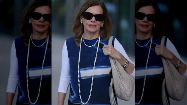 Woman wearing diamonds and pearls 