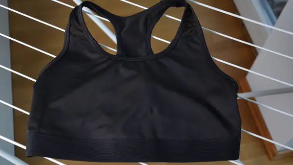 Sports bra on a laundry stand