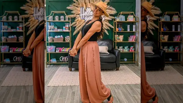 Woman in pink wide-leg pants