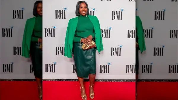 Woman in green leather pencil skirt 