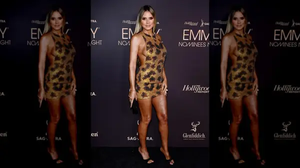 Heidi Klum on the red carpet in a leopard-print dress