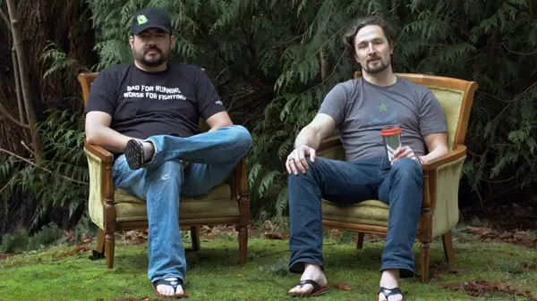 Matthew Griffin and Donald Lee sitting outside