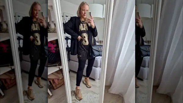 Woman wearing on oversized shirt