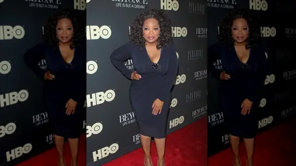 Oprah in a navy dress