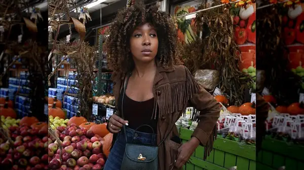 Woman in a fringe jacket