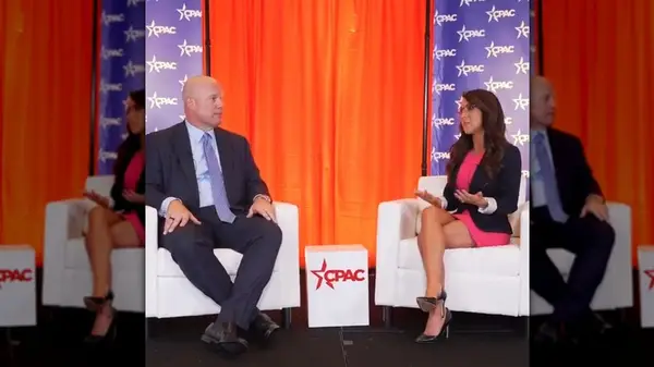 lauren boebert in a hot pink dress during CPAC interview