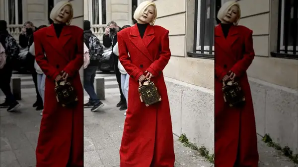 A woman in a red jacket 