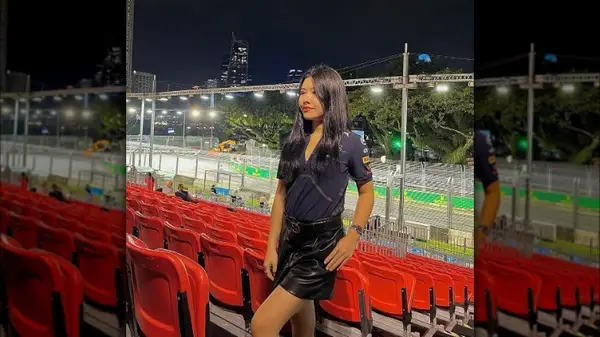 Woman wearing F1 top
