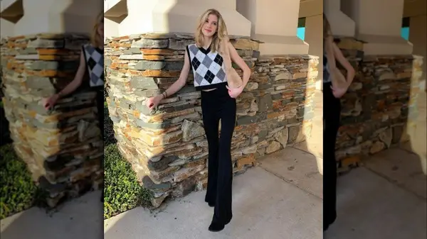 Leta Viola poses in flared pants