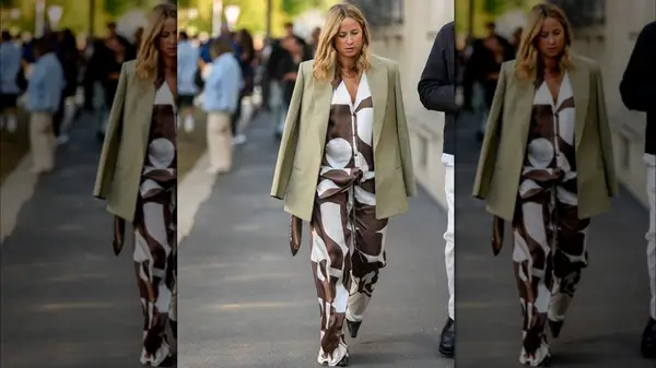 Woman with blazer over satin matching set 