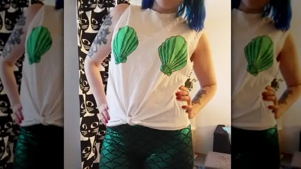 Woman in seashell t-shirt