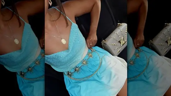 Woman in blue and gold dress 