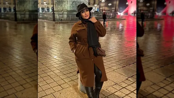 Wearing brown coat