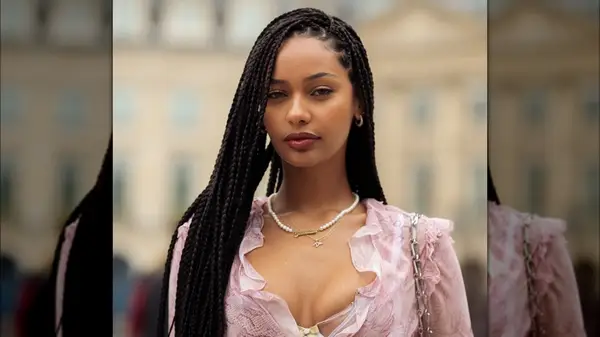 Woman with small necklaces on 