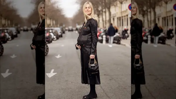 A woman in black sequins 