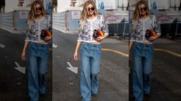 A woman in a white cardigan 