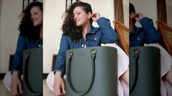 Woman with a bucket bag