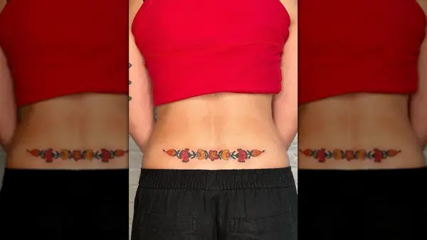 Lower back tattoo