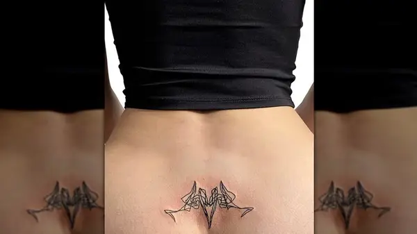 Lower back tattoo