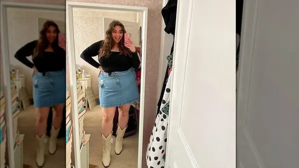 Woman in denim skirt