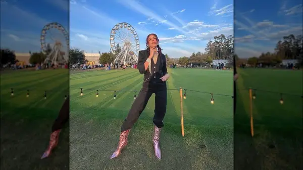 Woman wearing pink cowboy boots