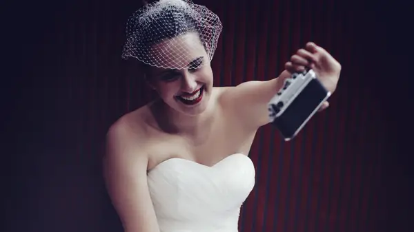 bride filming selfie video