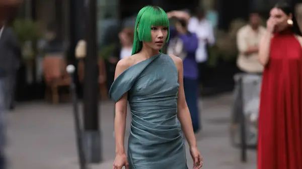 Woman in one shoulder dress