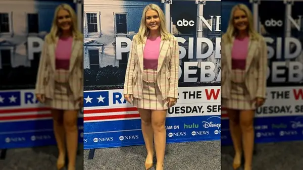 karoline leavitt dressed in a pink plaid suit