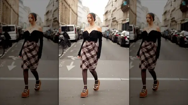 Woman wearing plaid midi skirt and platform sandals