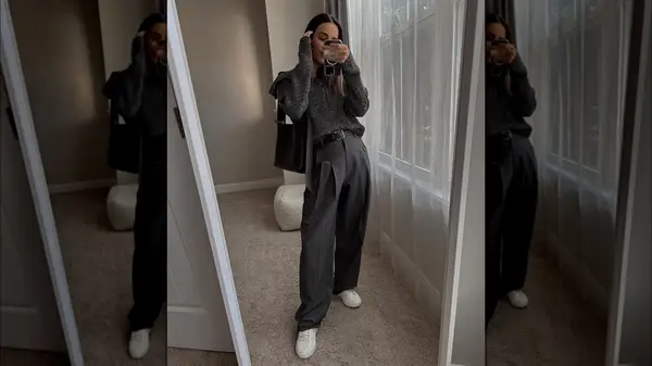 Woman in a gray outfit