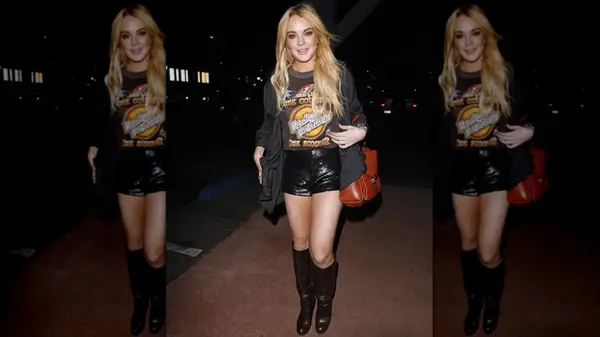 Lindsay Lohan walking on the street in leather mini shorts