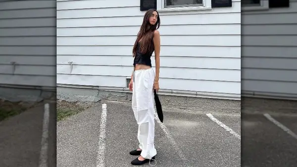 Woman wearing ballet flats and sweats