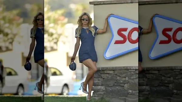 Paris Hilton wearing denim dress