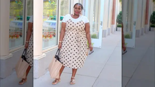 Woman in a polka dot dress over T shirt
