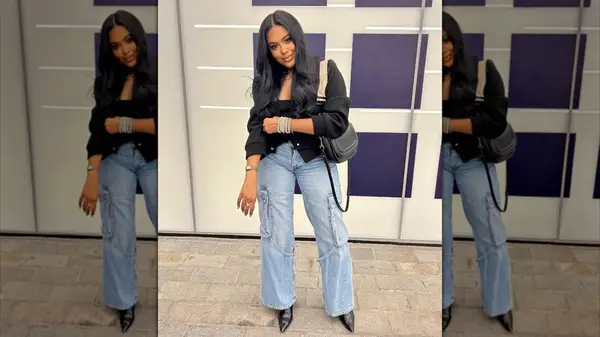 A woman posing in cargo jeans