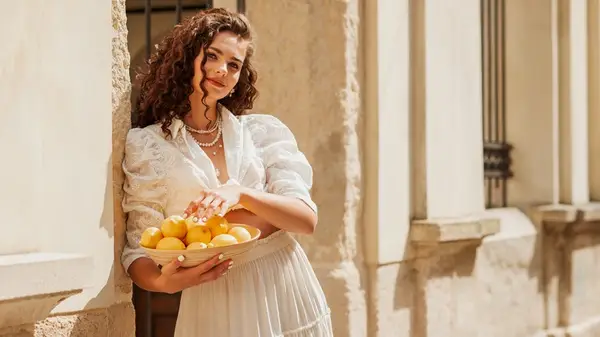 Woman wearing white linen dress