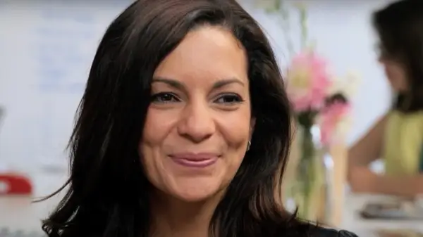 Catalina Girald in an interview with Glam, Inc. where she is smiling