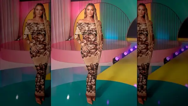 Khloe Kardashian posing in a neutral dress in 2021